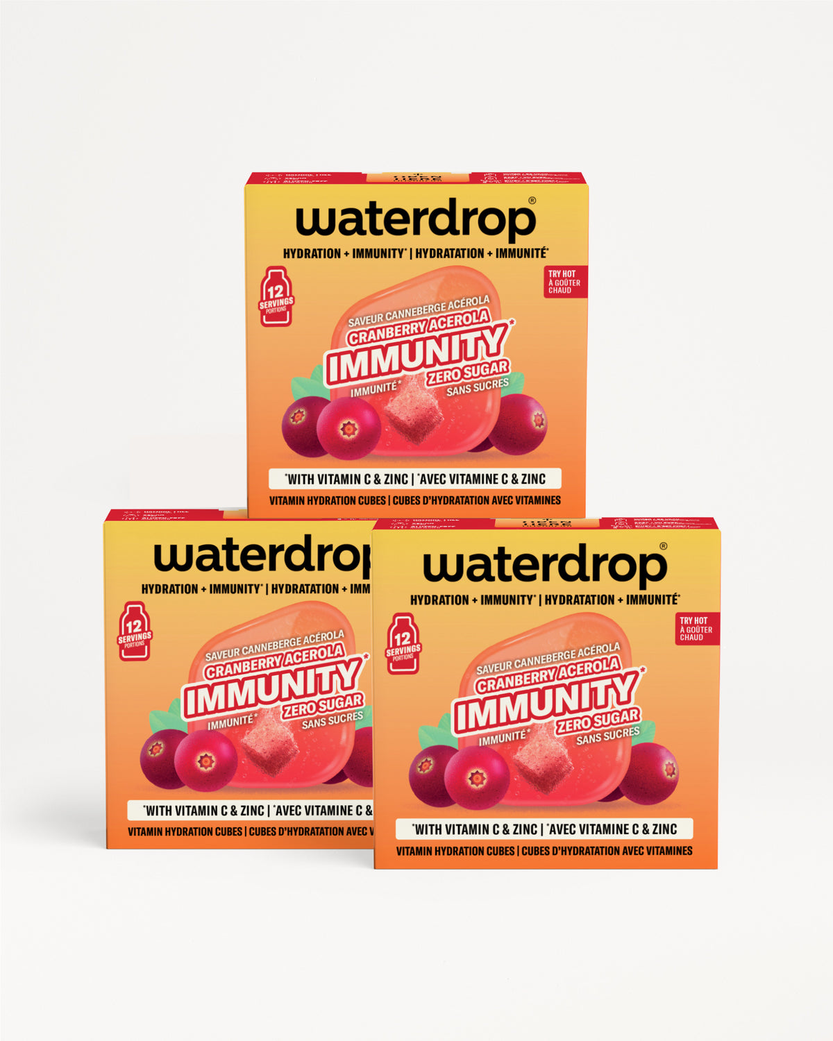 Tri narandžasto-žute kutije Waterdrop imunostite, složene jedna na drugu sa grafikom bobica.