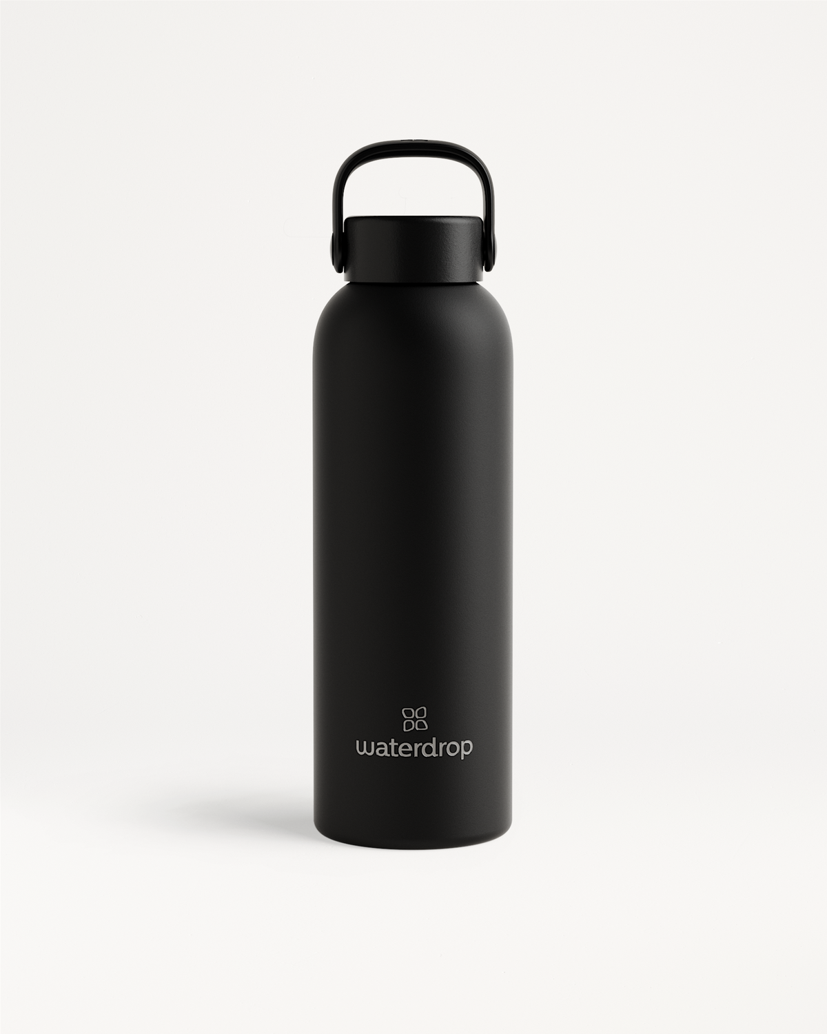 Thermo Steel Bottle · Carry Cap, matte-black, waterdrop branding near base.