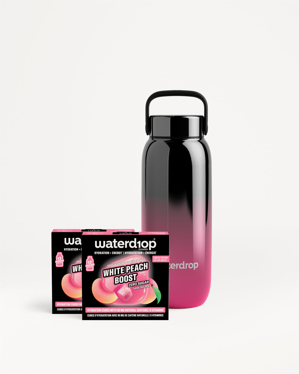 Boca za ponovnu upotrebu sa gradijentom od crne do ružičaste pored dve kutije Waterdrop.